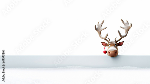 Fotografia, Obraz funny reindeer peeking his head out from behind a snowy wall