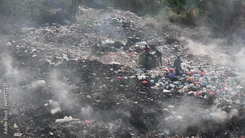 waste burning. Landfill and handling of household waste and industrial waste. plastic waste and food packaging. photo