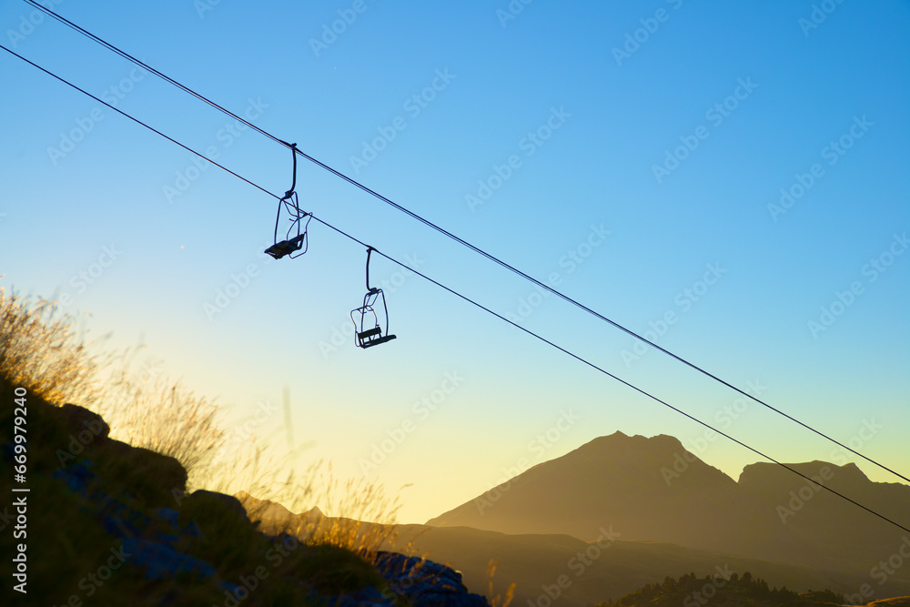 Silhouette of a chairlift in Candanchu, Pyrenees.