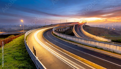 curved ramp of a highway over streets at sunrise with illumination and passing road traffic generative ai