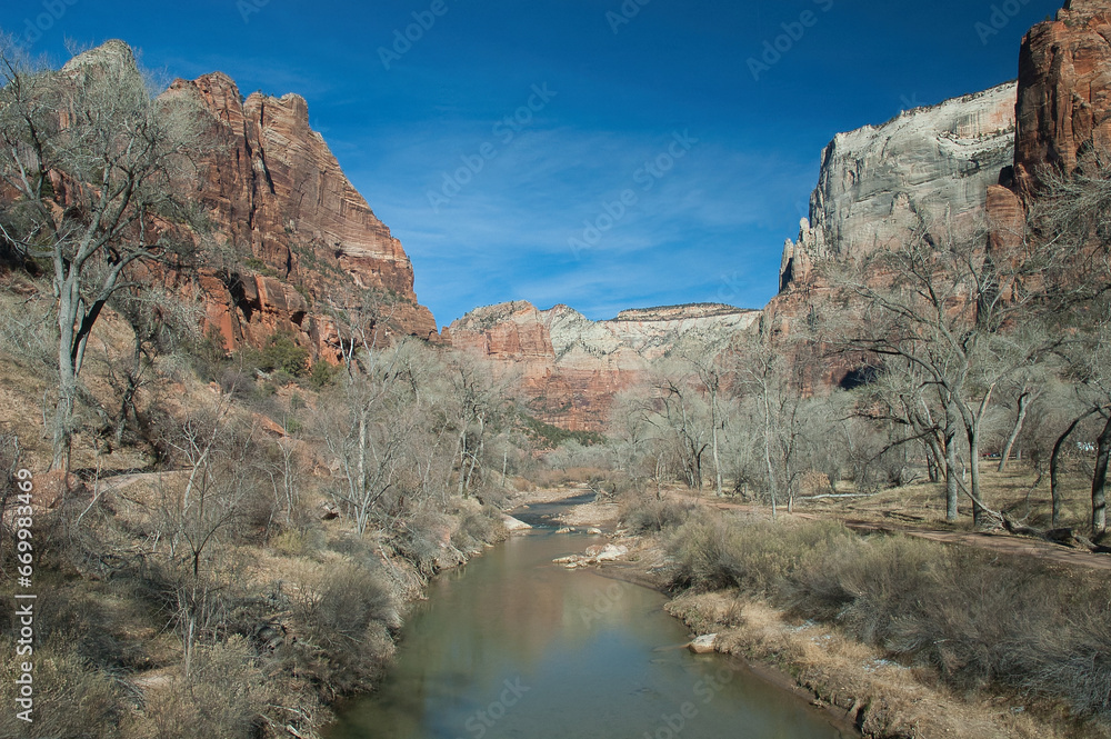 Springdale, Utah, United States – January 17 2006: The Virgin River carves through the world-class scenery of Zion National Park.