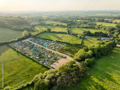 Obraz na plátně An aerial view of allotments set in beautiful rural countryside in the evening s