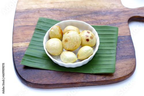 Djenkol fruit bean on white background photo