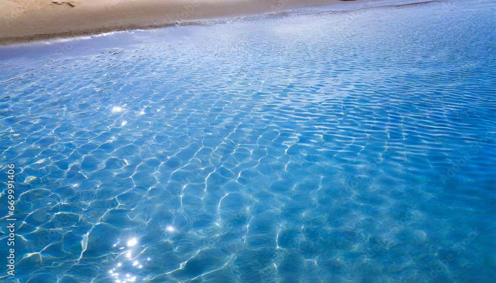 blue water with ripples on the surface with sand sea beach transparent ...