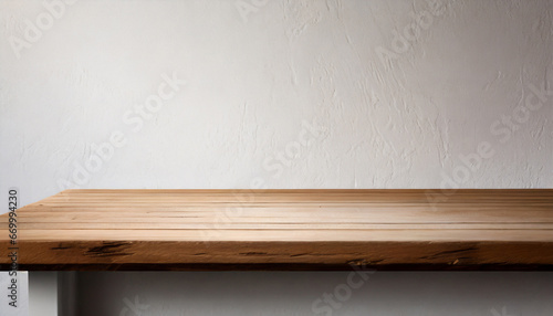 empty wooden table top on white wall background for product display high quality photo