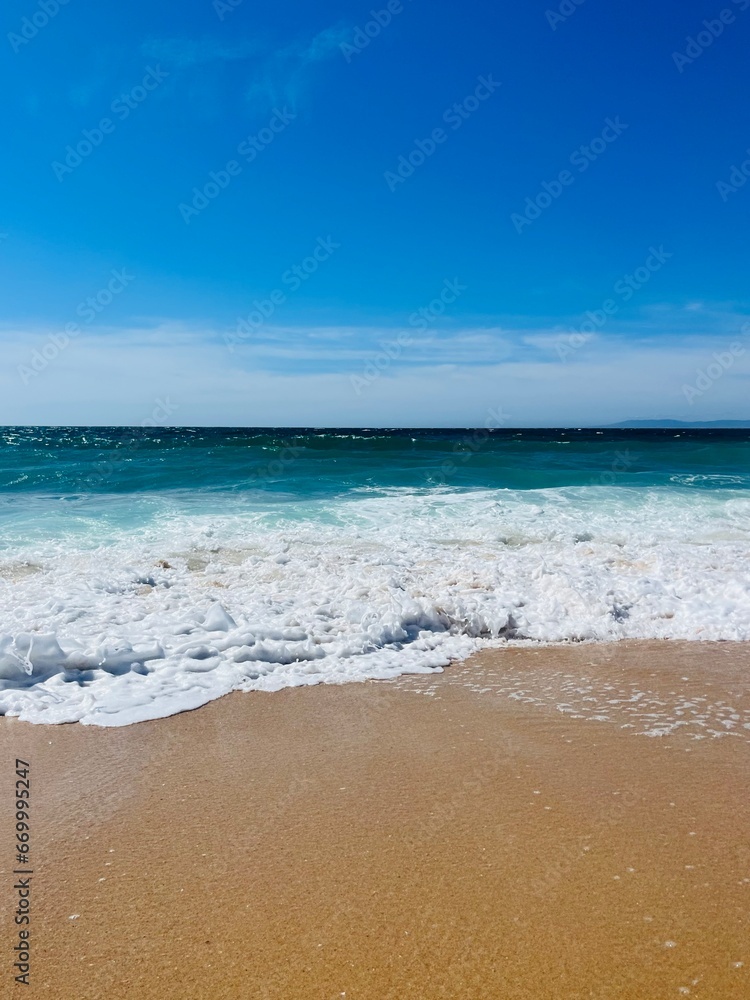sandy ocean coast, waves ocean, blue horizon, natural ocean shore background sandy ocean coast, waves ocean, blue horizon, natural ocean shore background
