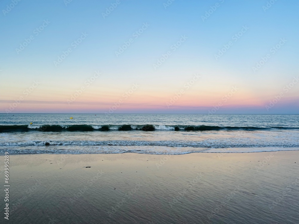 Calm sea horizon, early morning, before the sunrise at the sea, pastel colors