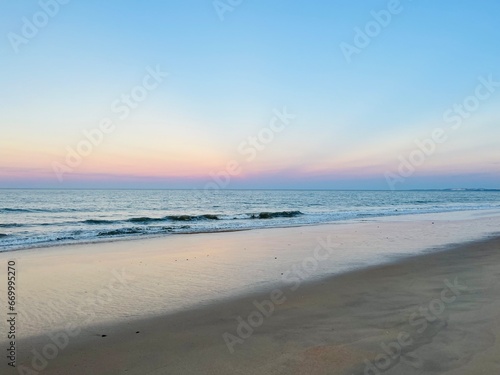 Calm sea horizon, early morning, before the sunrise at the sea, pastel colors