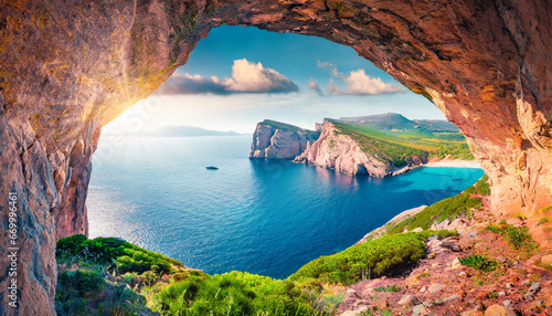 astonishing summer view of caccia cape from the small cave in the cliff fabulous morning scene of sardinia island italy europe aerial mediterranean seascape beauty of nature concept background