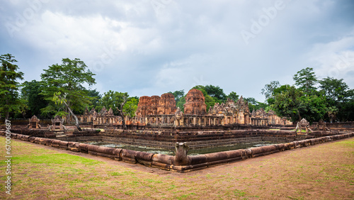 Fantastic ancient ruins of Prasat Muang Tam with a sacred well surrounding it near Phanom Rung Prasat Historical Park. Buriram Province, Thailand