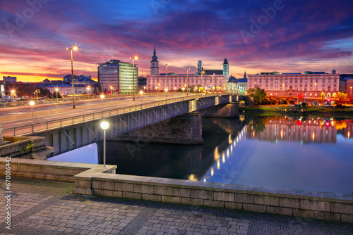 Linz, Austria. Cityscape image of riverside Linz, Austria at autumn sunrise with reflection of the city lights in Danube River.