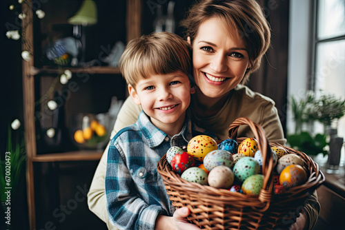 Mother and son celebrate Easter at home, enjoying the spring tra photo