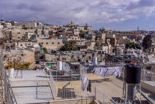 The roofs of houses and residential buildings at the Christian Quarter of Jerusalem Old Town in Israel. photo