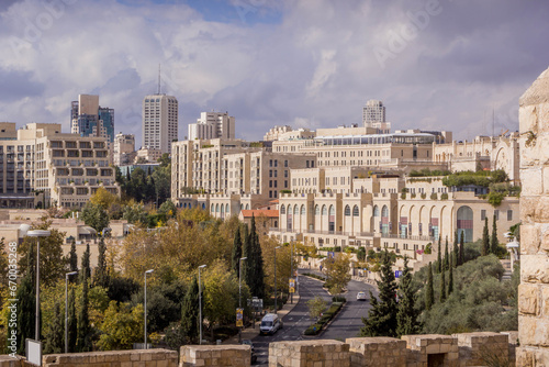 The downtown of Jerusalem, Israel, with the street road, David Citadel Hotel and shopping mall during the cloudy autumn day. photo