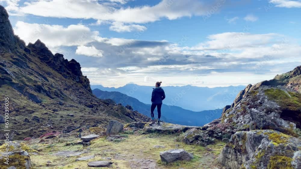 Lonely female enjoying Himalaya mountains Makalu Barun Park trekking route in Tulikharka 4100m. Mera peak climbing acclimatization walk. Active healthy life, traveling, sport mount climbing 4K video. Lonely female enjoying Himalaya mountains Makalu Barun Park trekking route in Tulikharka 4100m. Mera peak climbing acclimatization walk. Active healthy life, traveling, sport mount climbing 4K video.