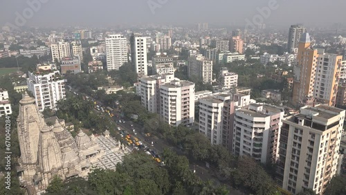 View of the imposing Birla Mandir temple and the skyline of Kolkata, India photo