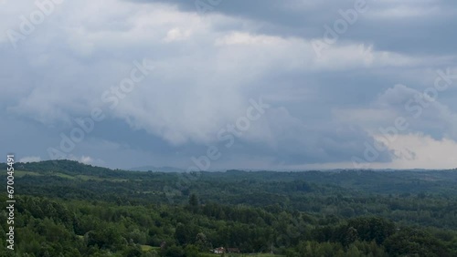 Stormy cloud above countryside, severe weather photo