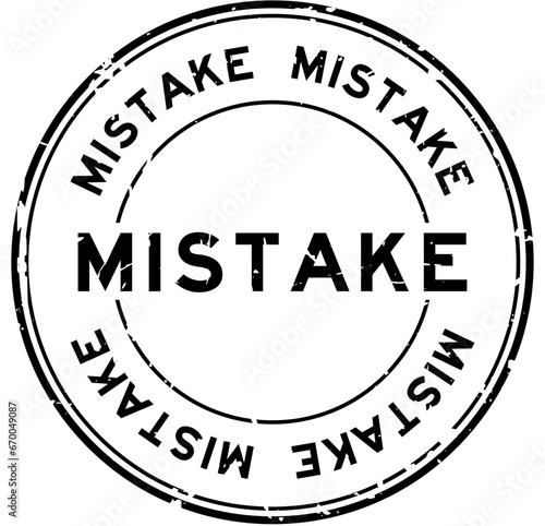 Grunge black mistake word round rubber seal stamp on white background