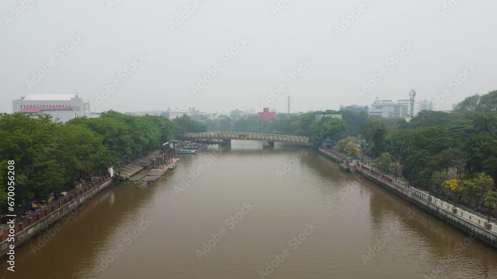 The Siring Banjarmasin river area is filled with rental motorboats used for Banjarmasin river tourism The Siring Banjarmasin river area is filled with rental motorboats used for Banjarmasin river tourism