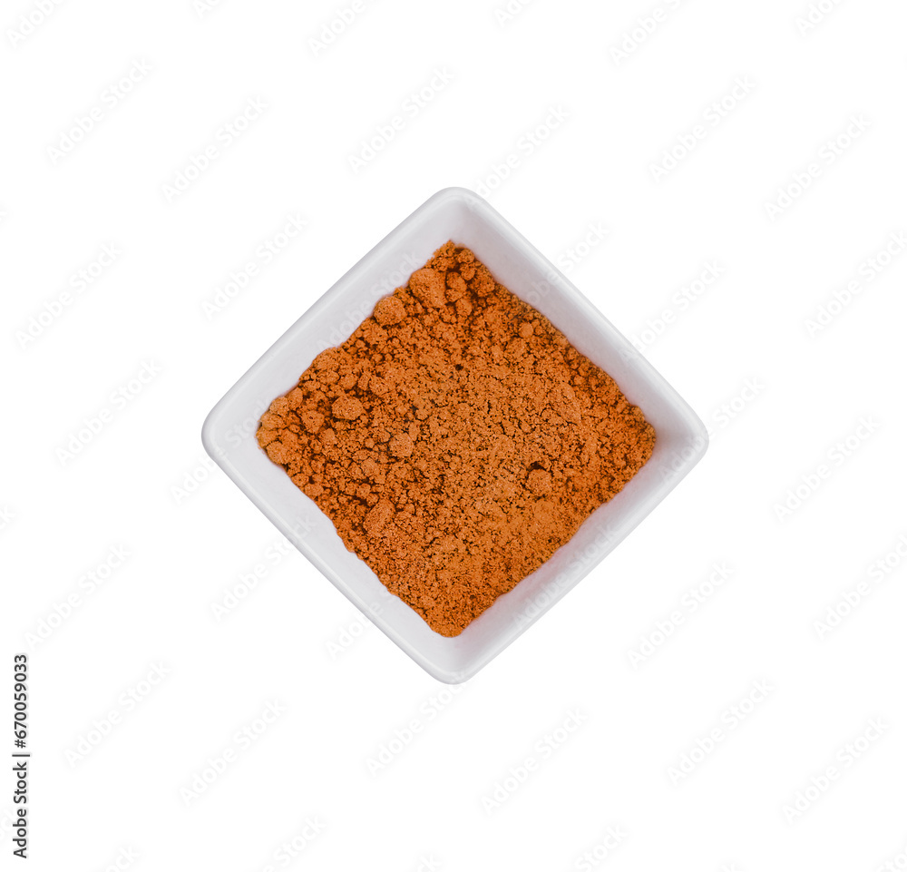 red indian spice in a ceramic bowl red indian spice in a ceramic bowl