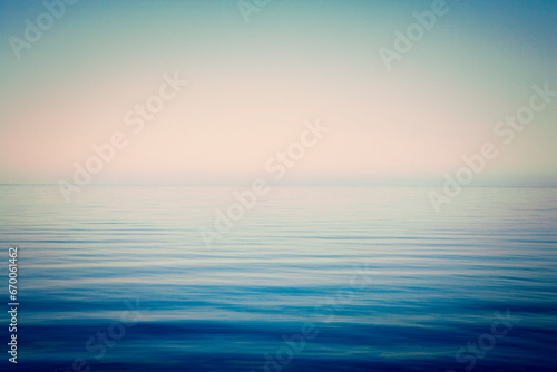 Background of sky and sea, sea is very calm with gentle ripples, instagram effect.
