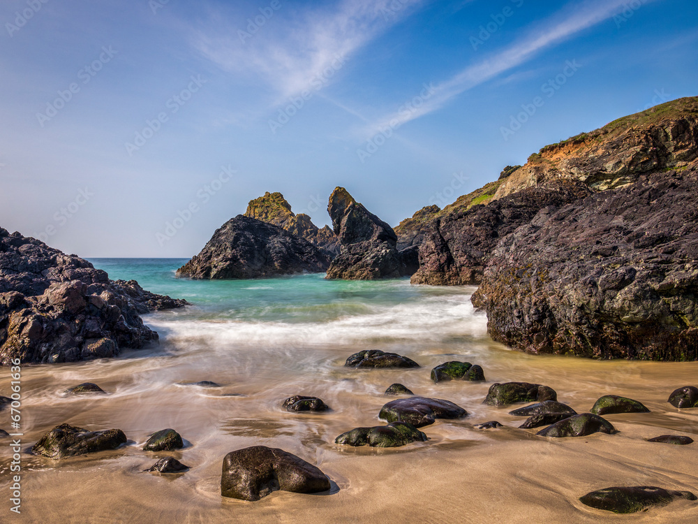 Incoming tide at Kynance Cove, a renowned beauty spot on the Lizard peninsula in southern Cornwall.