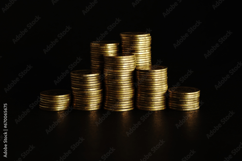Gold coins on black background, Saving money concept Gold coins on black background, Saving money concept