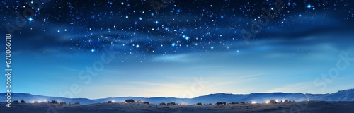 A breathtaking night sky with a mesmerizing display of stars over majestic mountains