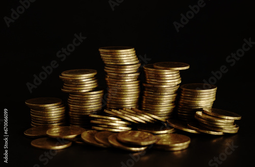 Gold coins on black background, Saving money concept