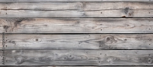Close up of a textured wooden wall background old and grey