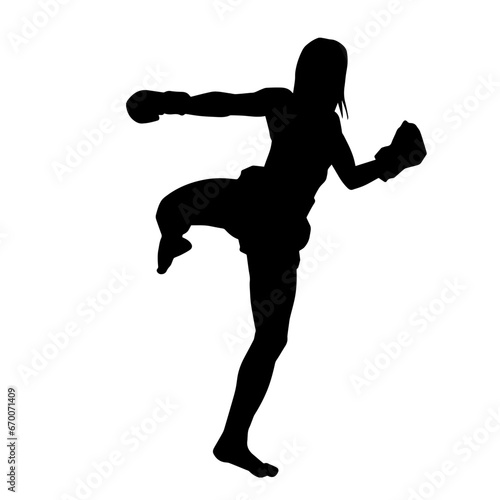 Silhouette of a woman doing a martial art kick. Silhouette of a sporty female doing kicking movement.
