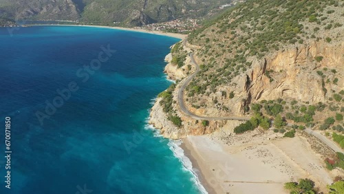 Scenic drone view of sea coast of Turkiye. Landscape of Oludeniz and coastal road. Opening view photo