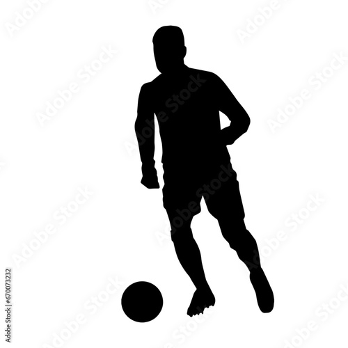 Silhouette of a male soccer player kicking a ball. Silhouette of a football player in action pose.