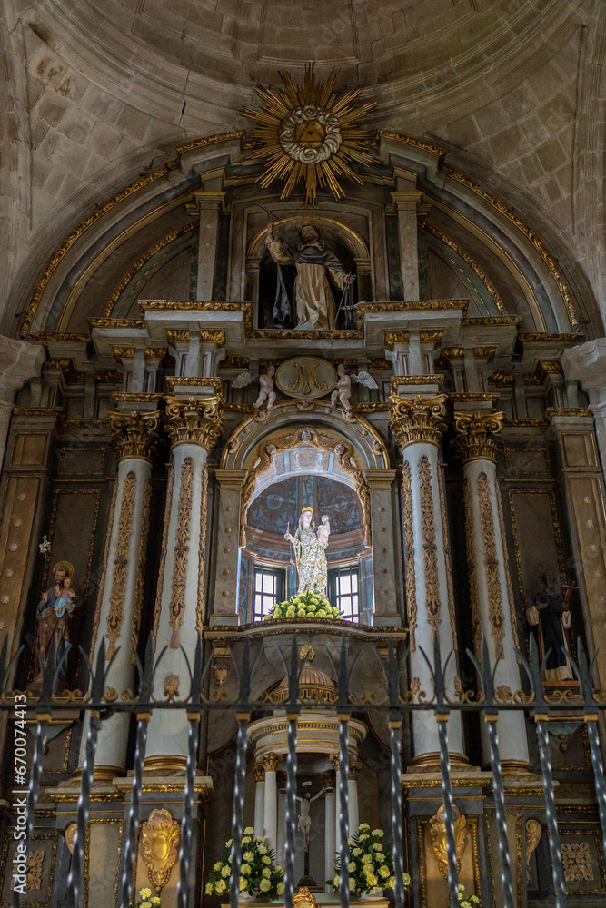 Intricate Altar within the Serene Walls of a Catholic Church