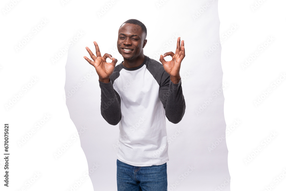 close-up portrait of a young charismatic bright handsome American guy with a short haircut in a sweatshirt with a smile close-up portrait of a young charismatic bright handsome American guy with a short haircut in a sweatshirt with a smile