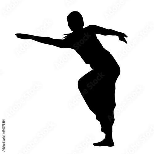 Silhouette of a female dancer in action pose. Silhouette of a woman dancing happily.