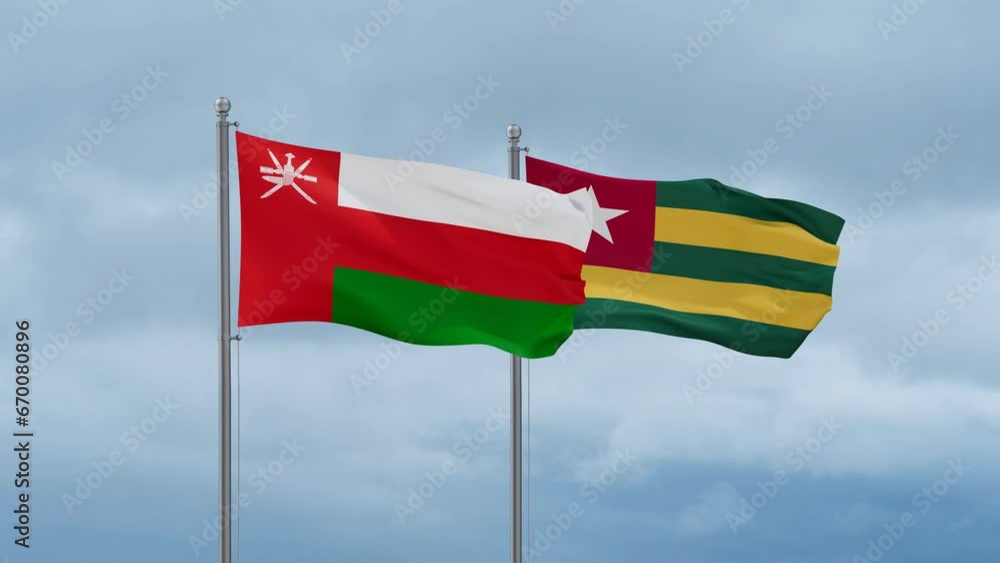 Togo, Togolese Republic and Oman flag waving together on cloudy sky, endless seamless loop, two country cooperation concept Togo, Togolese Republic and Oman flag waving together on cloudy sky, endless seamless loop, two country cooperation concept