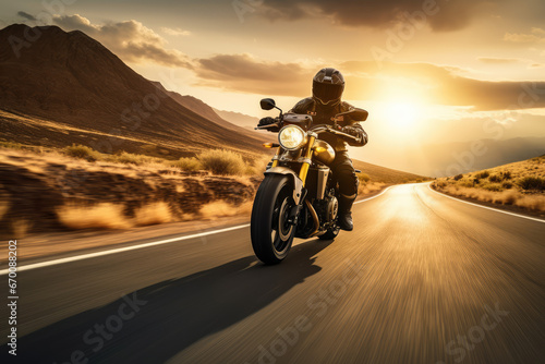 Person riding a powerful motorcycle at high speed © Kitta