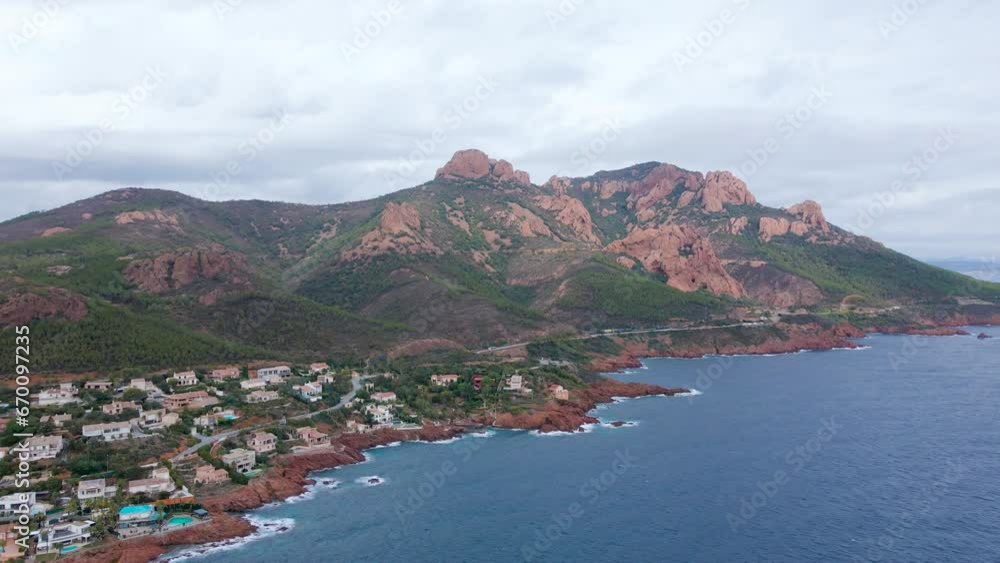 Aerial view of Rocher Saint-Barthélémy at French Riviera. In the footage can be seen the beautiful Rocher Saint-Barthélémy and the coast, shoot from a drone at a higher altitude. Aerial view of Rocher Saint-Barthélémy at French Riviera. In the footage can be seen the beautiful Rocher Saint-Barthélémy and the coast, shoot from a drone at a higher altitude.