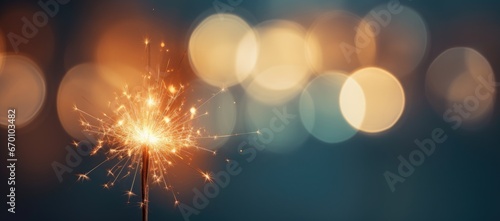 A close-up of a Bengal light on a urban blurred background. Celebration of the new year and Christmas. Party accessory