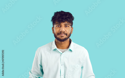 Fotografía Studio shot of a young Indian man with curly black hair