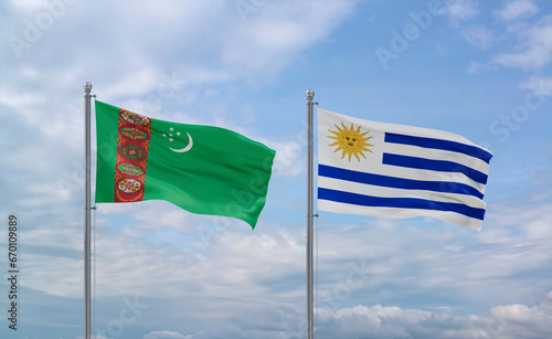 Uruguay and Turkmenistan flags, country relationship concept