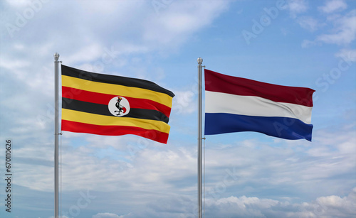 Netherlands and Uganda flags  country relationship concept