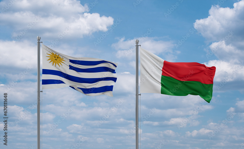 Madagascar and Uruguay flags, country relationship concept Madagascar and Uruguay flags, country relationship concept