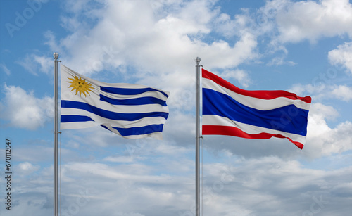 Thailand and Uruguay flags, country relationship concept