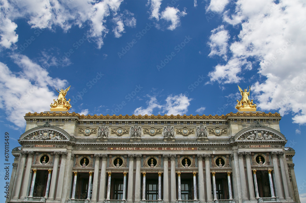 Opera Garnier (Garnier Palace)  against the background of a beautiful sky with clouds, Paris, France. Translation: national Academy of Music. UNESCO World Heritage Site