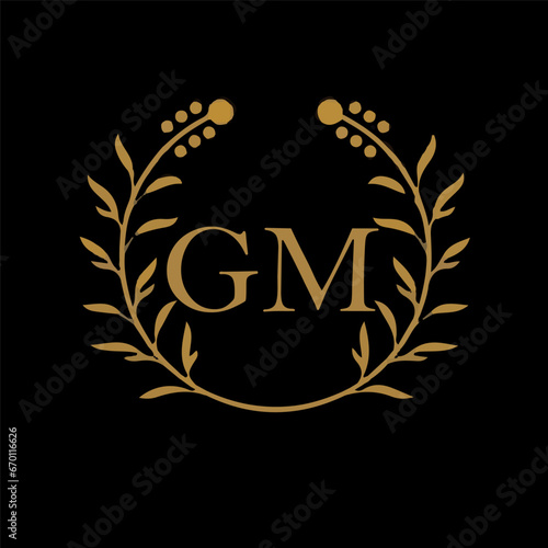 GM letter branding logo design with a leaf