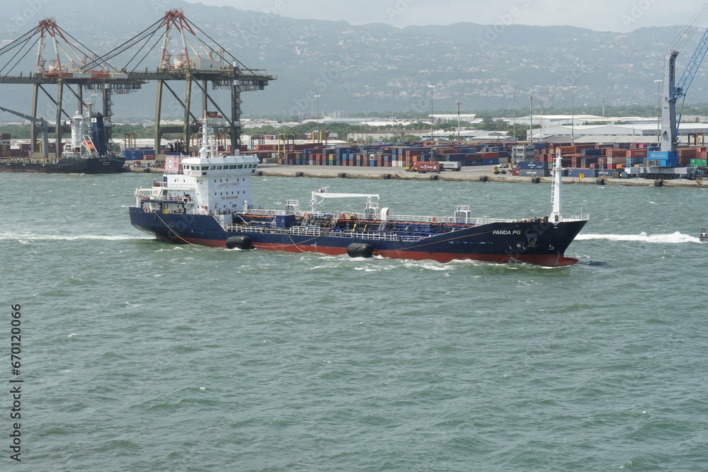 Kingston, Jamaica 05 25 2023 Small oil chemical tanker PANDA PG with blue hull, white