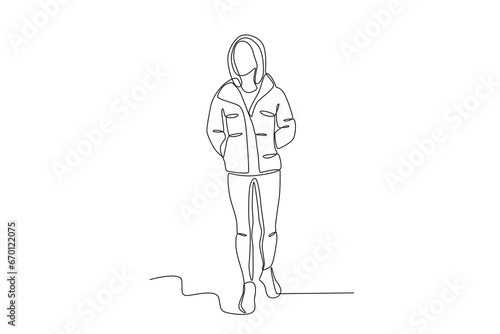 A beautiful woman wearing a thick down jacket. Winter outfit one-line drawing