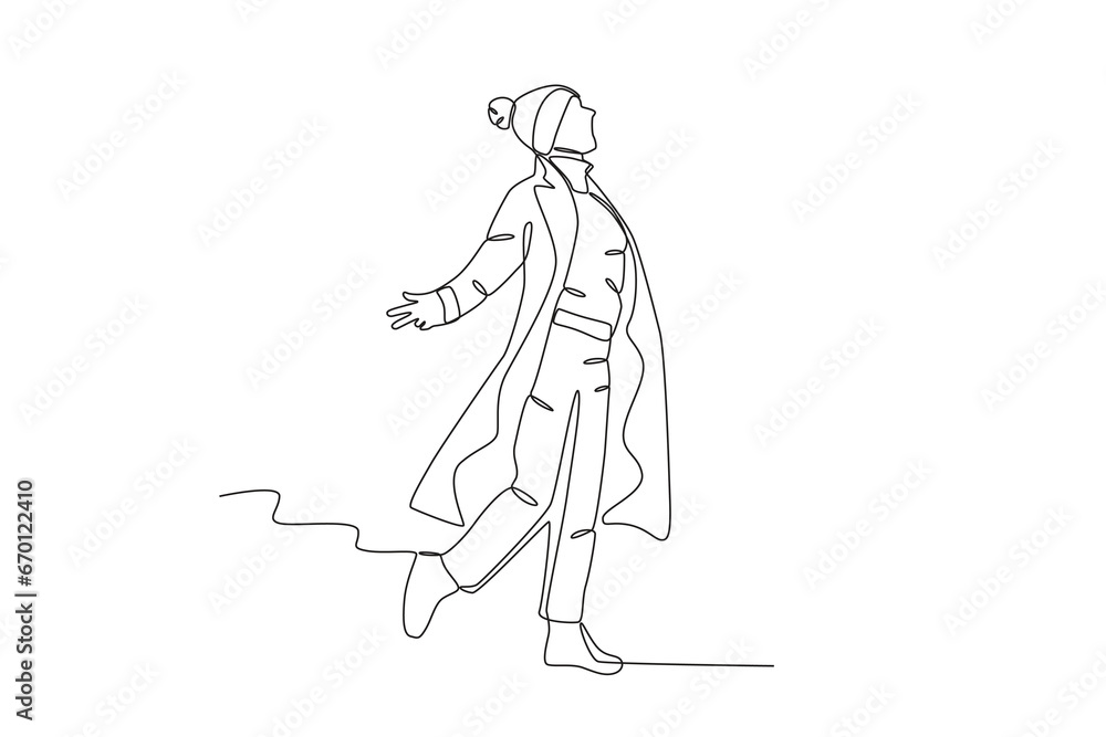 A happy woman wearing winter clothes. Winter outfit one-line drawing